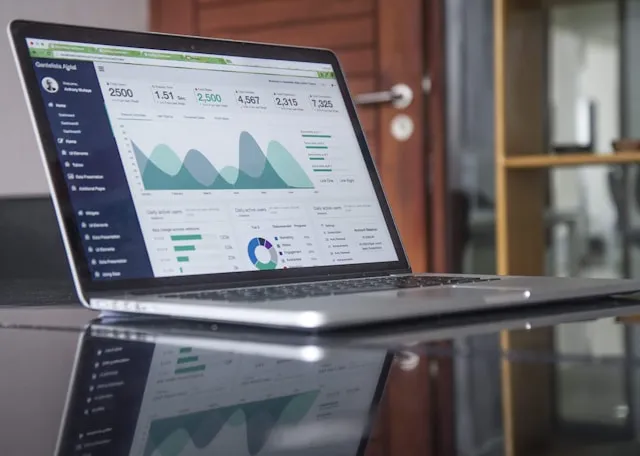 Laptop screen showing analytics dashboard
